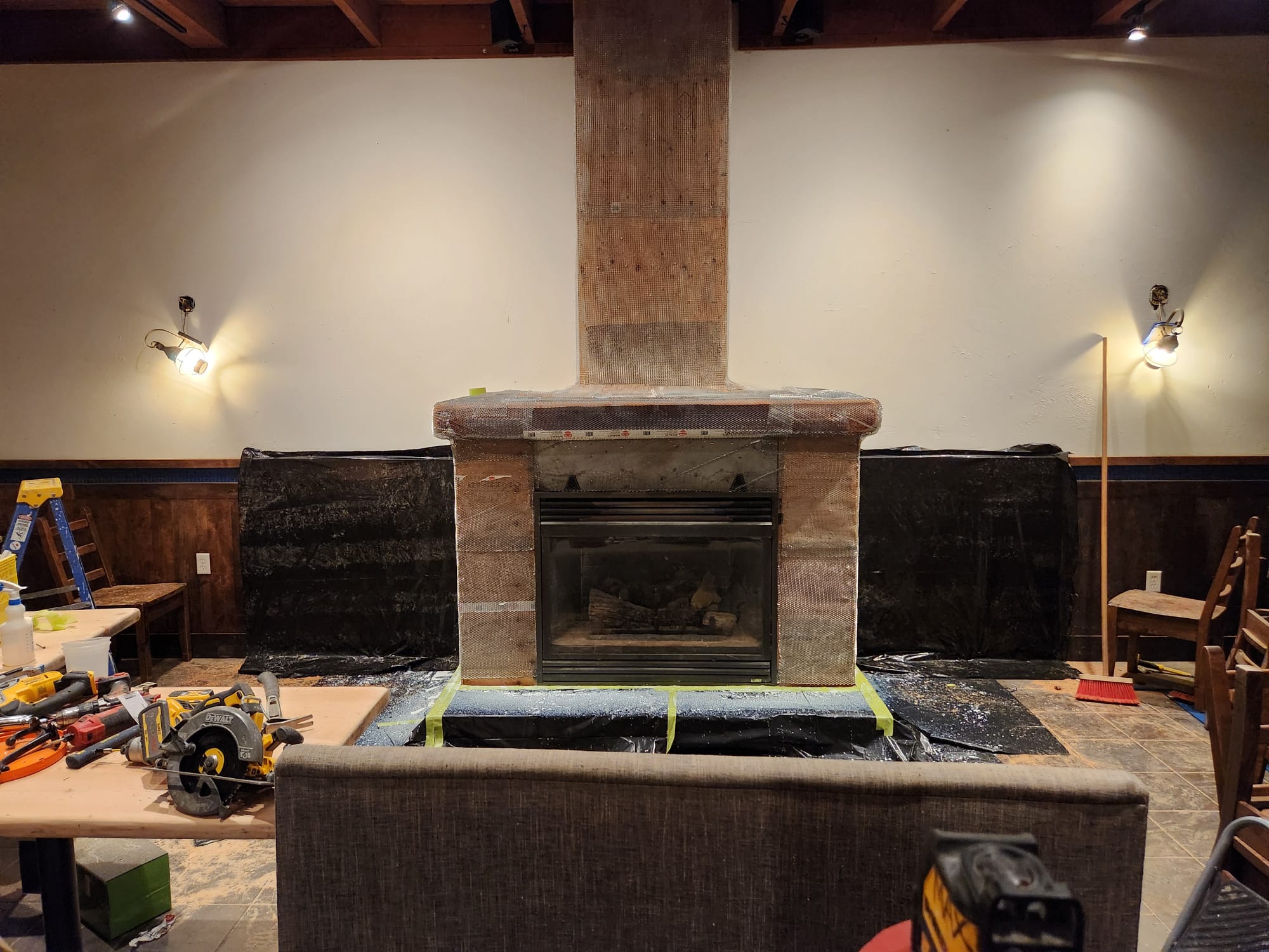 Restaurant fireplace fully reinforced with metal mesh before coating